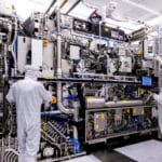 Business ASML Employees assembling an EUV system ASML top